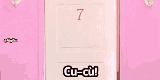 a woman is peeking out from behind a door with the number 7 on it