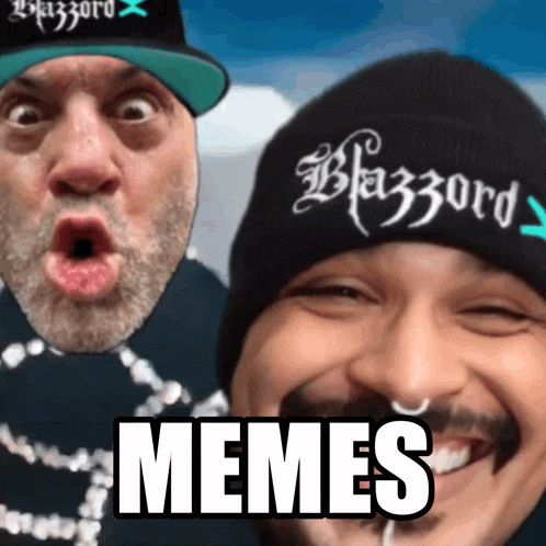two men are posing for a picture and one of them is wearing a beanie that says blazzard