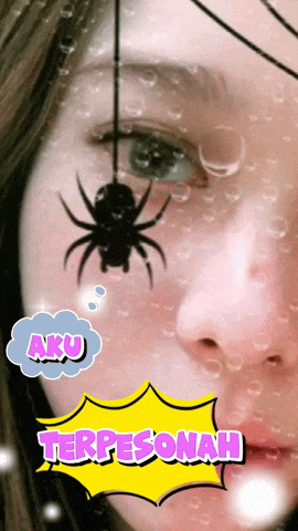 a girl with a spider on her face and the words aku terpesonah below her