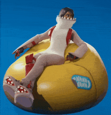 a person is sitting on a banana that says nana nana on it