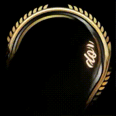 a close up of a gold ring with the word god on it