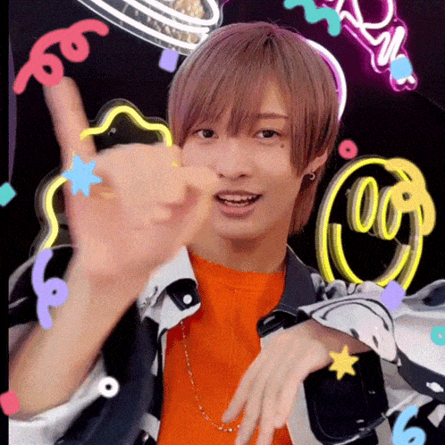 a young man giving a thumbs up in front of a smiley face with the number 6 on it