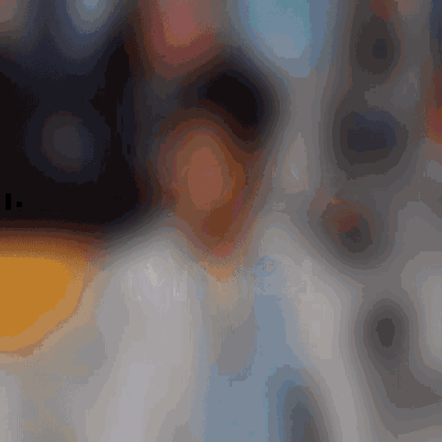 a blurry picture of a person 's face with a blurred background