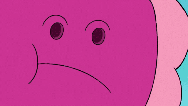 a close up of a pink cartoon character 's face