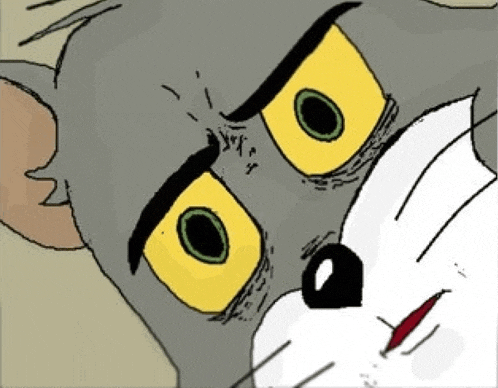 a close up of a cartoon character 's face with yellow eyes