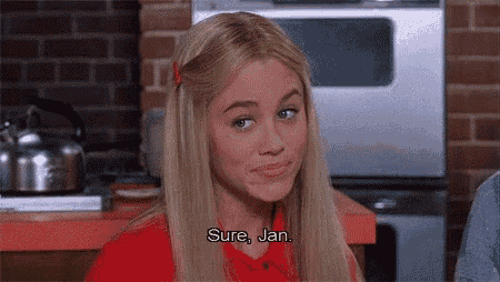 a blonde woman in a red shirt is talking to a man in a kitchen and says `` sure , jan '' .
