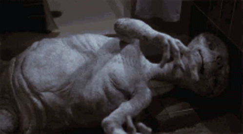 Et Dying GIF - Et Dying Laughing GIFs