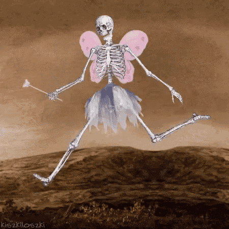 a skeleton is dressed as a fairy and holding a wand