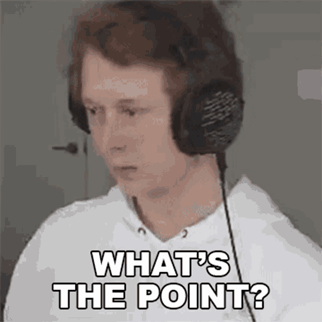 a man wearing headphones is looking at the camera and says `` what 's the point ? ''