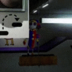 a cartoon character is standing on a broom in front of a video game console .