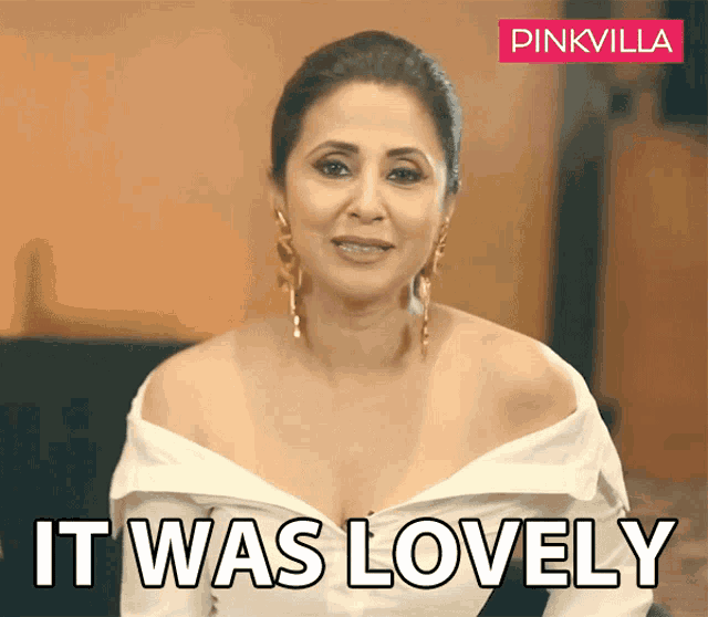 a woman says it was lovely while wearing a white top