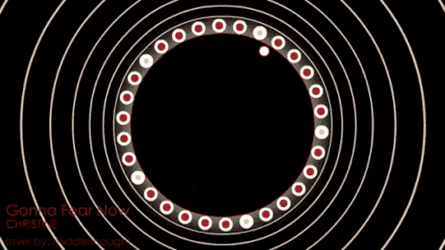 a circular pattern with triangles and circles on a red and black background