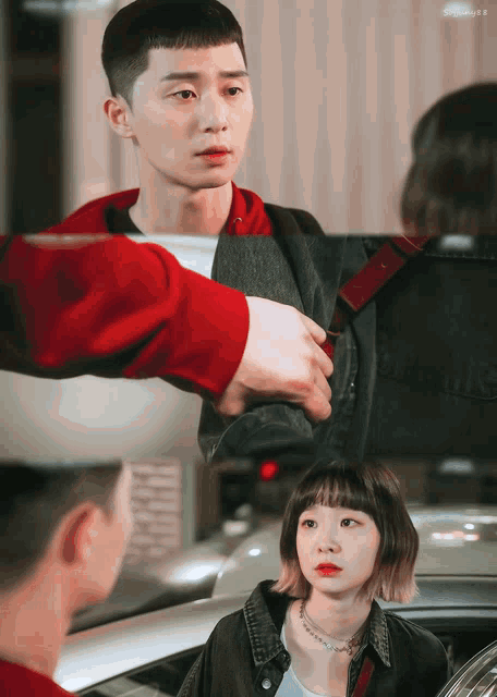 a man in a red hoodie holds a bag over a woman in a black jacket