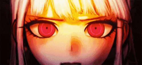 a close up of a girl 's face with glowing red eyes and white hair .