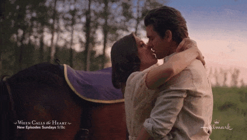 a man and woman kissing in front of a horse with the words " when calls the heart " written on the bottom