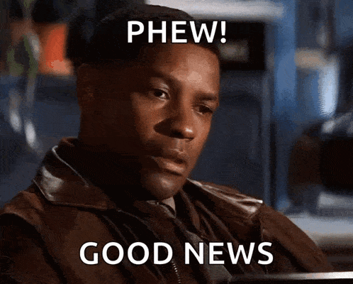 a man in a brown jacket and tie says phew and good news