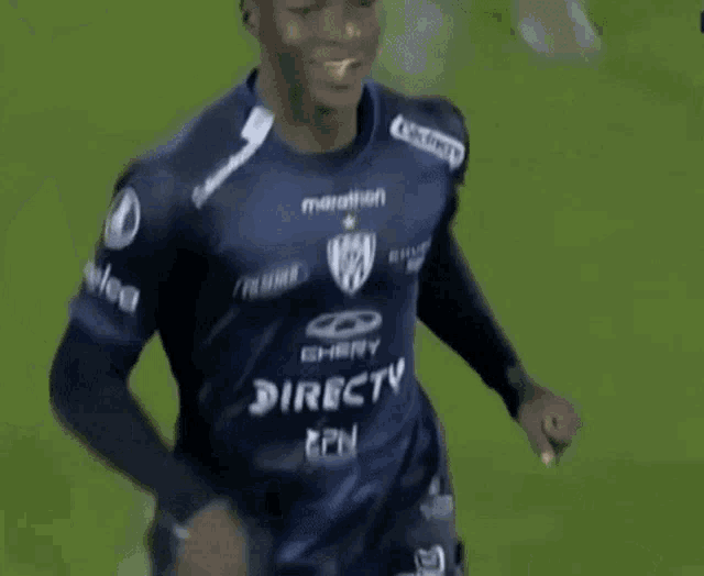 a soccer player wearing a shirt that says directv