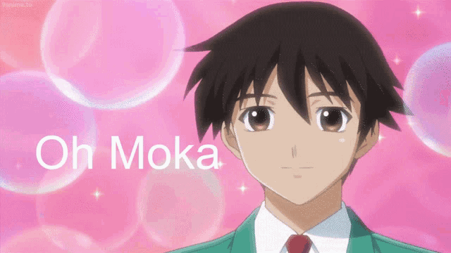 a boy in a green suit and red tie is surrounded by pink bubbles and the words oh moka