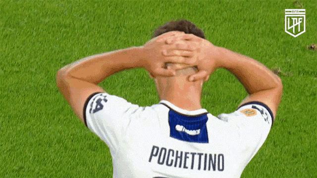 a soccer player with the name pochettino on his shirt