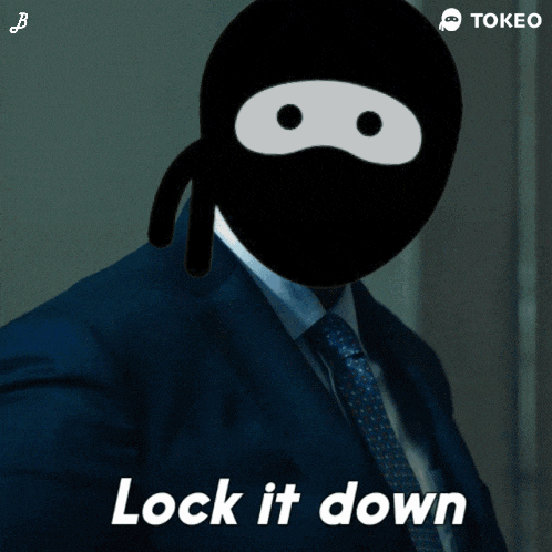 a man in a suit has a ninja mask on his face and the words lock it down below him