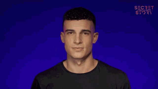 a man is making a funny face in front of a blue background that says secret stories