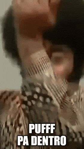 a close up of a person 's face with the words `` puff pa dentro '' written on the bottom .