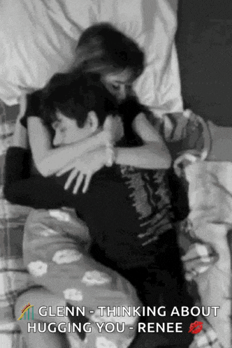 glenn is thinking about hugging renee while laying on a bed
