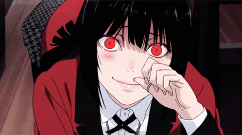 a close up of a girl with red eyes