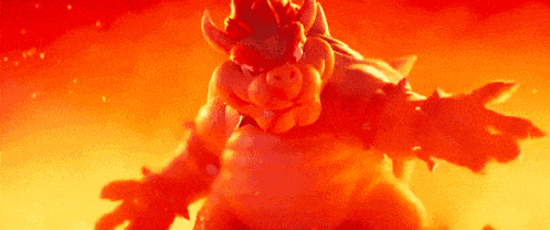 bowser is standing in the middle of a fire with his arms outstretched in a video game .