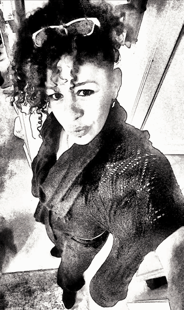 a black and white drawing of a woman with curly hair