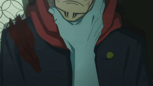 a close up of a person 's face with a hand holding it