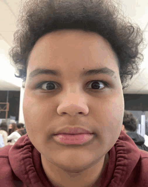 a close up of a person 's face with their eyes closed