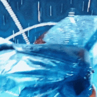 a painting of a person swimming in a pool of blue water