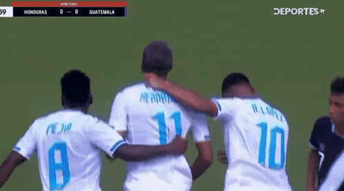 a group of soccer players are hugging each other and one has the number 10 on his back