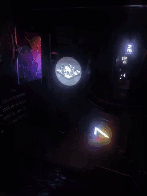 a dark room with a light that says ' ae ' on the bottom
