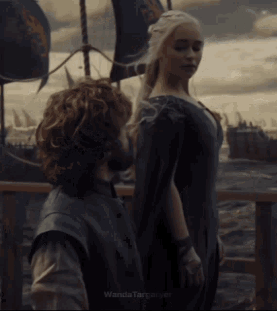 a picture of a man and a woman with wanda targaryen on the bottom