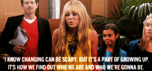 a woman stands in front of a group of people and says " i know changing can be scary