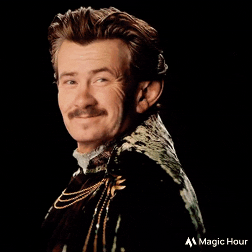 a man with a mustache is wearing a jacket that says magic hour on it