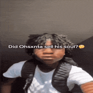 a man with a backpack is asking if ohsxnta sold his soul