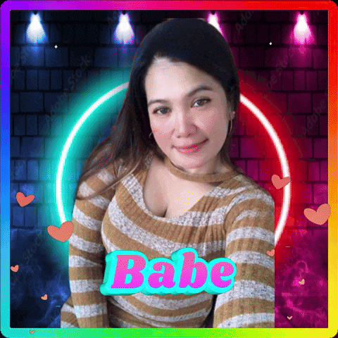 a woman in a striped sweater is surrounded by hearts and the word babe