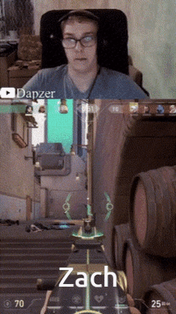 a man wearing glasses is playing a video game with the name zach