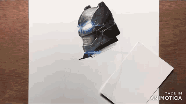 a drawing of batman made in animatica is on a piece of paper