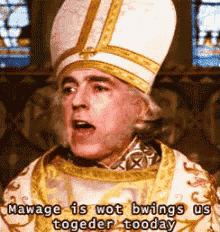 a priest says mawage is wot bwings us togedeer tooday