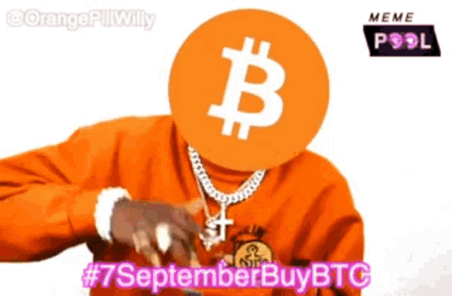 a man wearing an orange sweater with a bitcoin symbol on his face