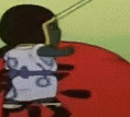 a cartoon character is standing next to a red object and holding a stick .