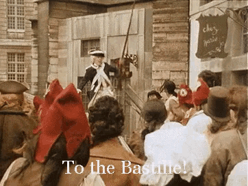 a crowd of people are gathered in front of a building with the words to the basline written on it