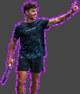 a man wearing a shirt that says six ca zero is holding a tennis racquet