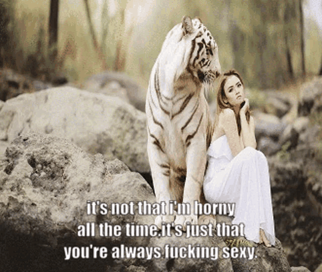 a woman in a white dress sits next to a white tiger that says it 's not that