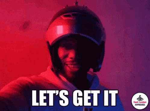 a man wearing a helmet with the words let 's get it on it .