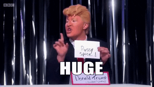 a man in a donald trump costume holds a sign that says pussy spice